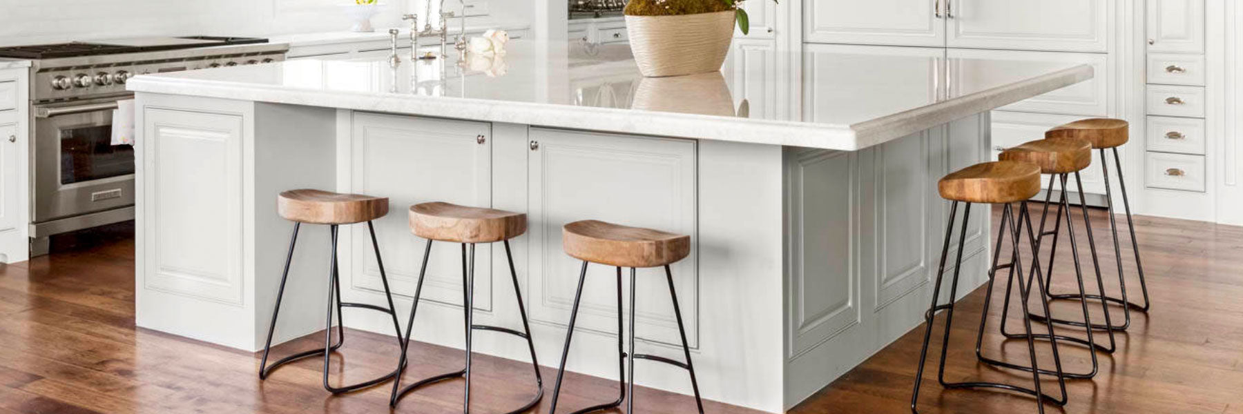 Hidden Granite Countertop Brackets supporting a large granite coutertop overhang on kitchen island.