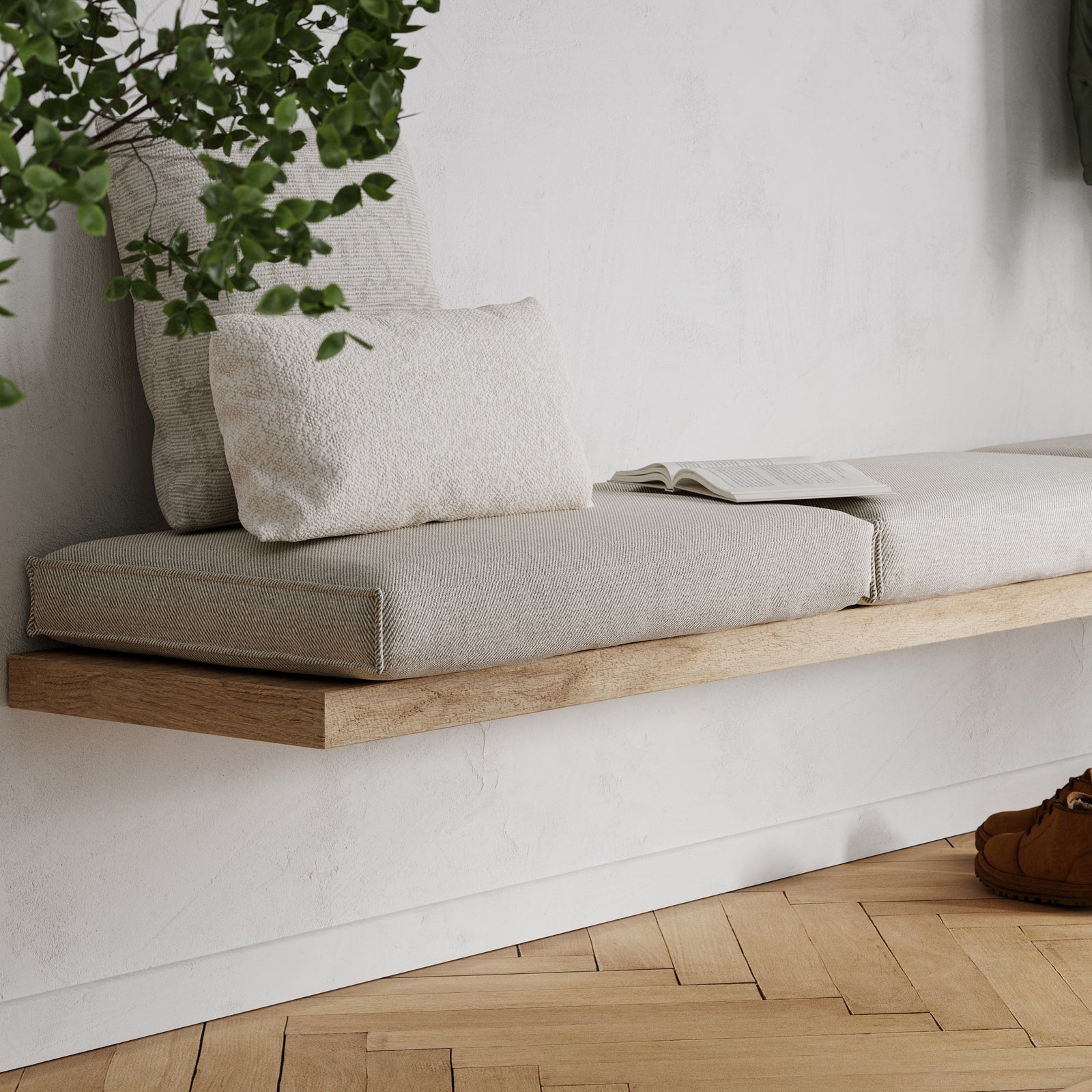 THIS IS A SCENE IMAGE OF OUR FLOATING BENCH BRACKETS INSTALLED OVER FINISHED DRYWALL. THE BRACKETS ARE HOLDING UP A THICK 2" WOOD BENCH WITH CUSHION SEATS ON TOP IN A FRONT ENTRYWAY.