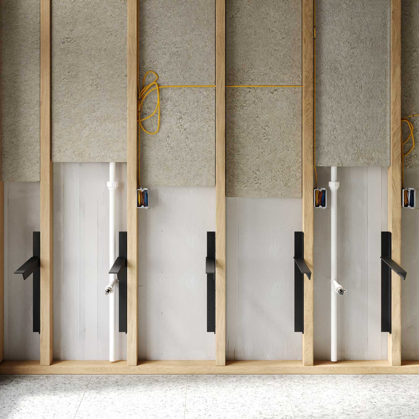 HD Hidden Floating Vanity Brackets installed on wall studs, ready to support a floating sink in a bathroom under construction.