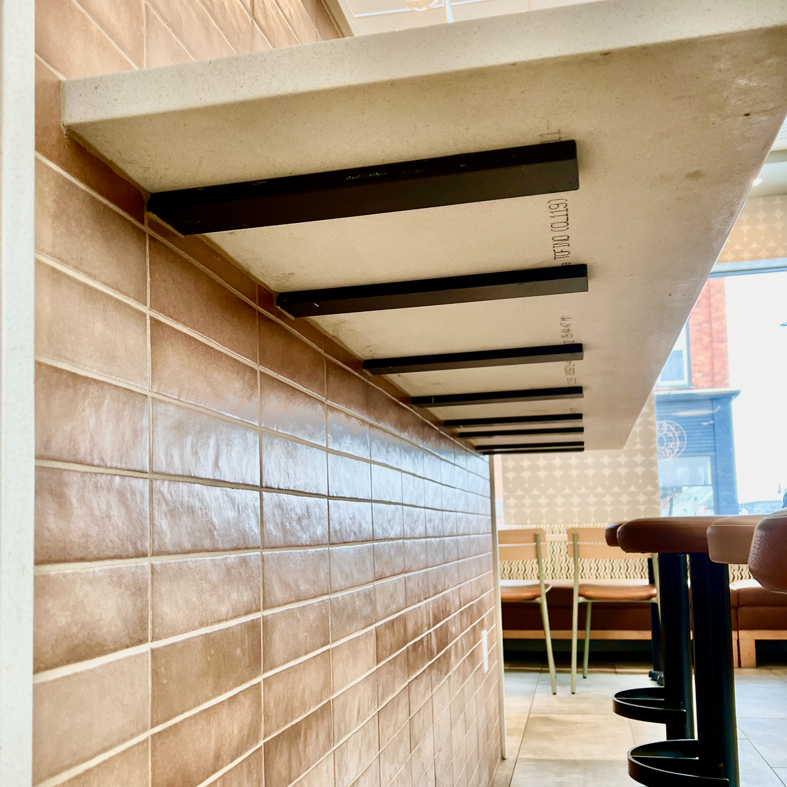 Floating Countertop Wall Bracket installed under the counter. Provides hidden support for floating countertops, bars, desks, and more.
