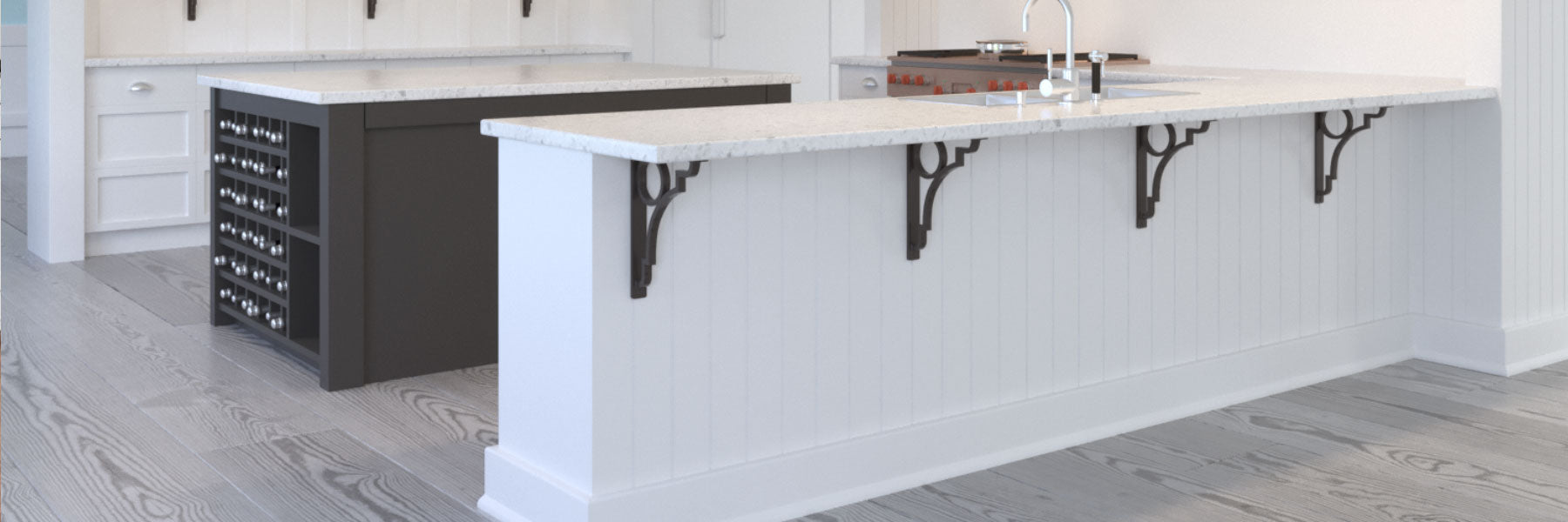 Decorative Iron Corbels supporting a large granite countertop overhang on this kitchen peninsula. 